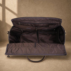 Coffee cowhide garment travel duffel with organized empty interior