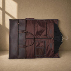 Coffee cowhide garment travel duffel open garment section and pockets