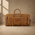 Brown leather shoe pocket travel bag, clean front view