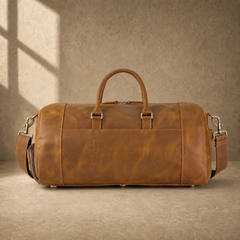 Brown leather shoe pocket travel bag, rear view