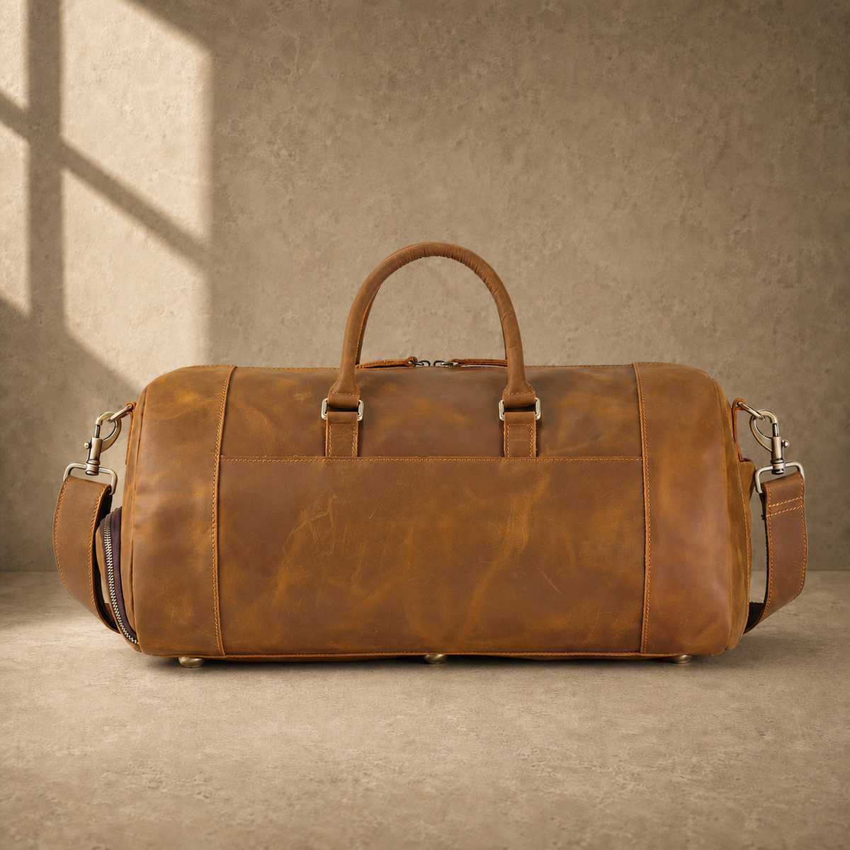 Brown leather shoe pocket travel bag, rear view