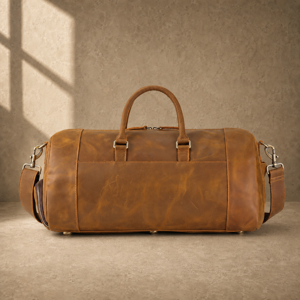 Brown leather shoe pocket travel bag, rear view