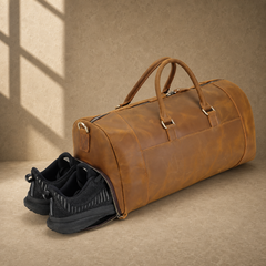 Brown leather travel bag with shoes in the separate side compartment