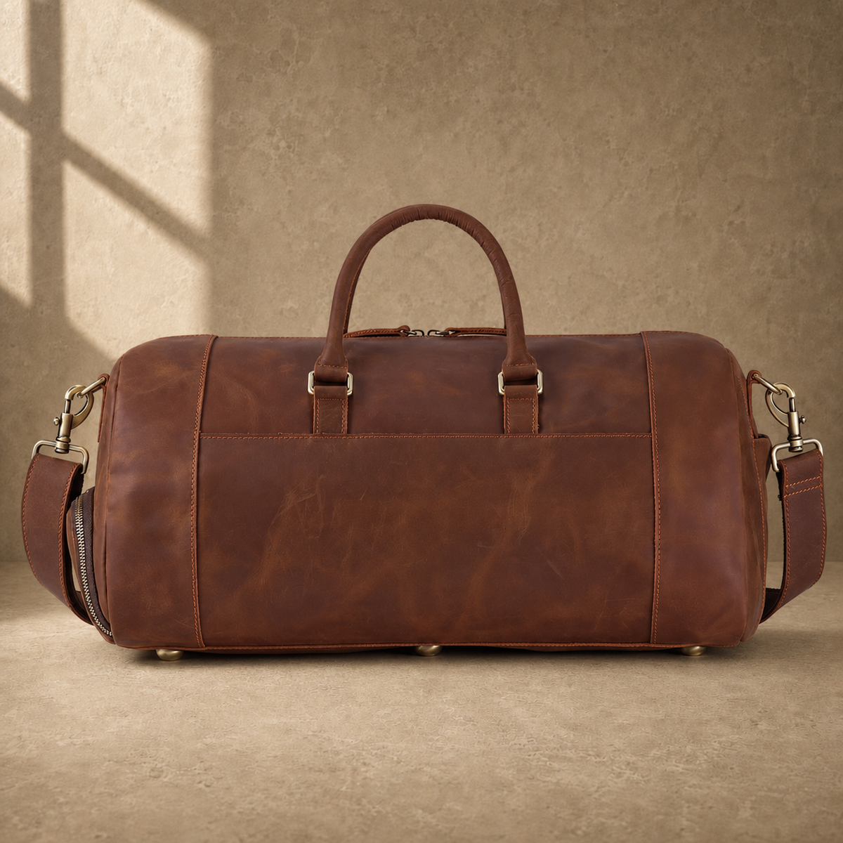 Dark brown shoe pocket travel duffel, rear view