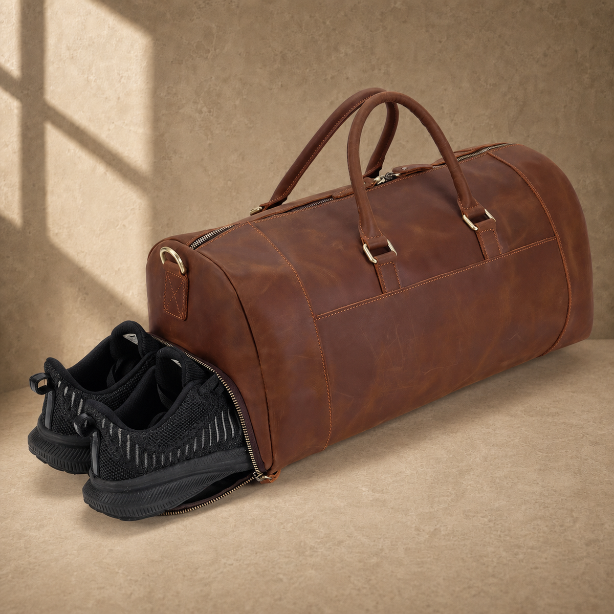 Dark brown travel duffel showing separate shoe compartment