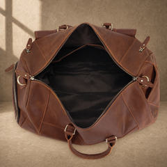 Dark brown shoe pocket travel duffel showing open main compartment
