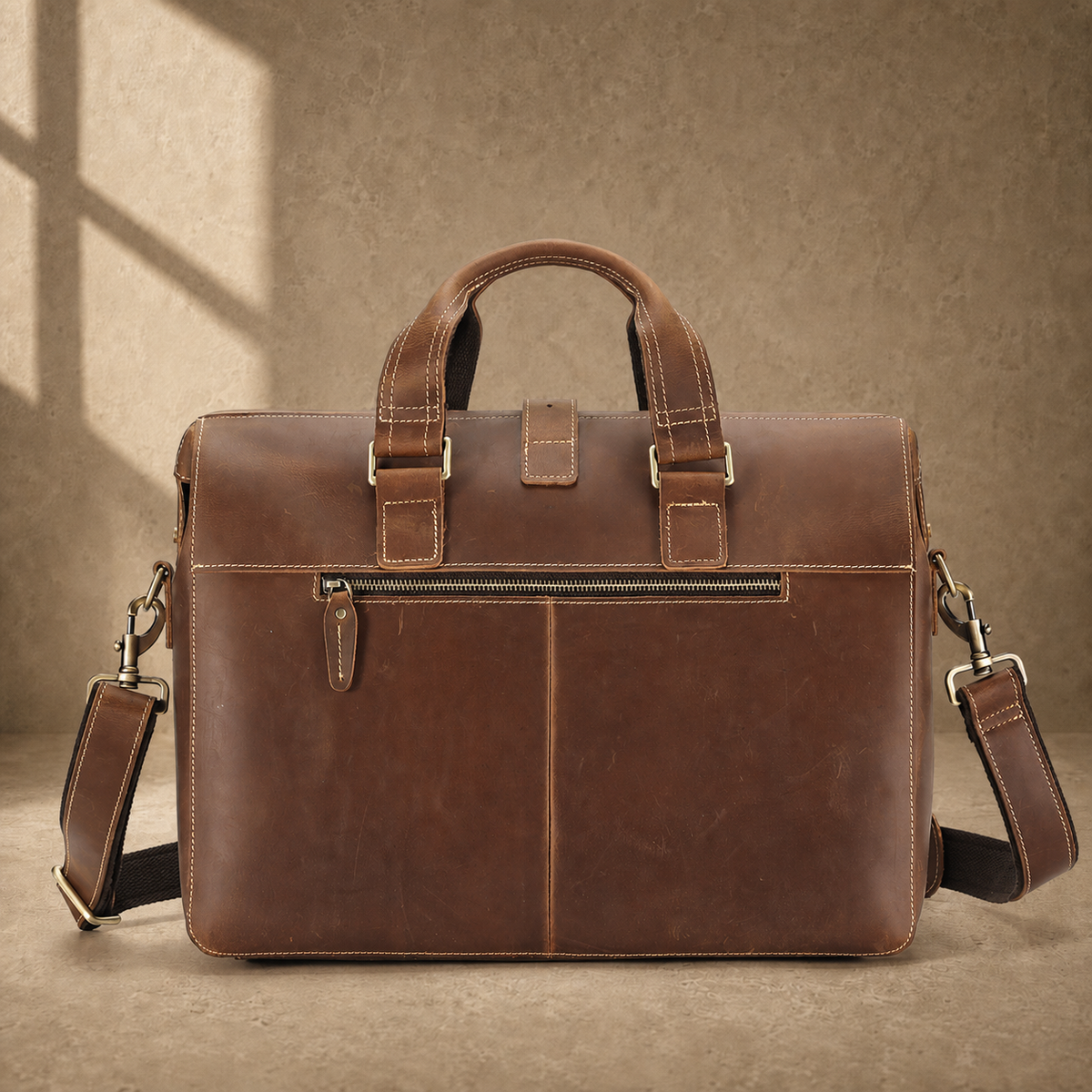 Dark brown leather business work bag, rear zipper view