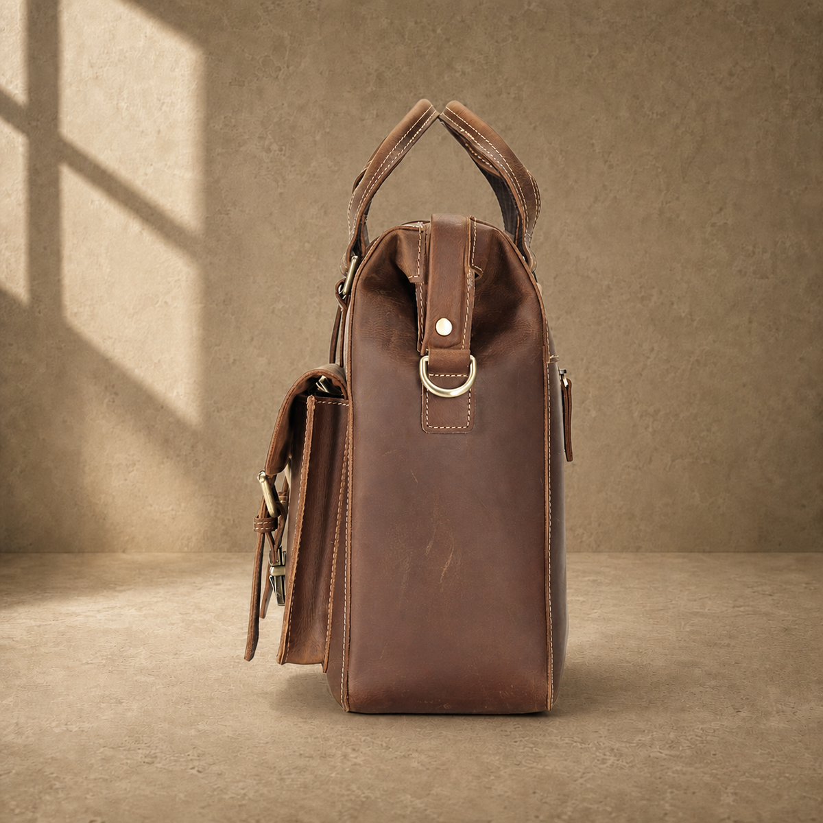 Dark brown leather business work bag, side profile view
