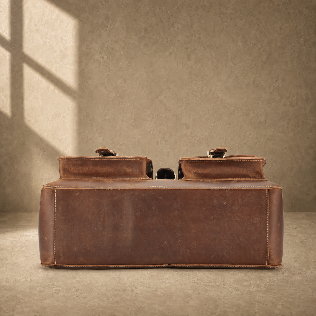 Dark brown leather business work bag, base view