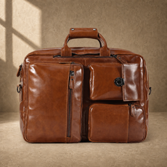 Brown leather convertible laptop bag without shoulder strap, front view
