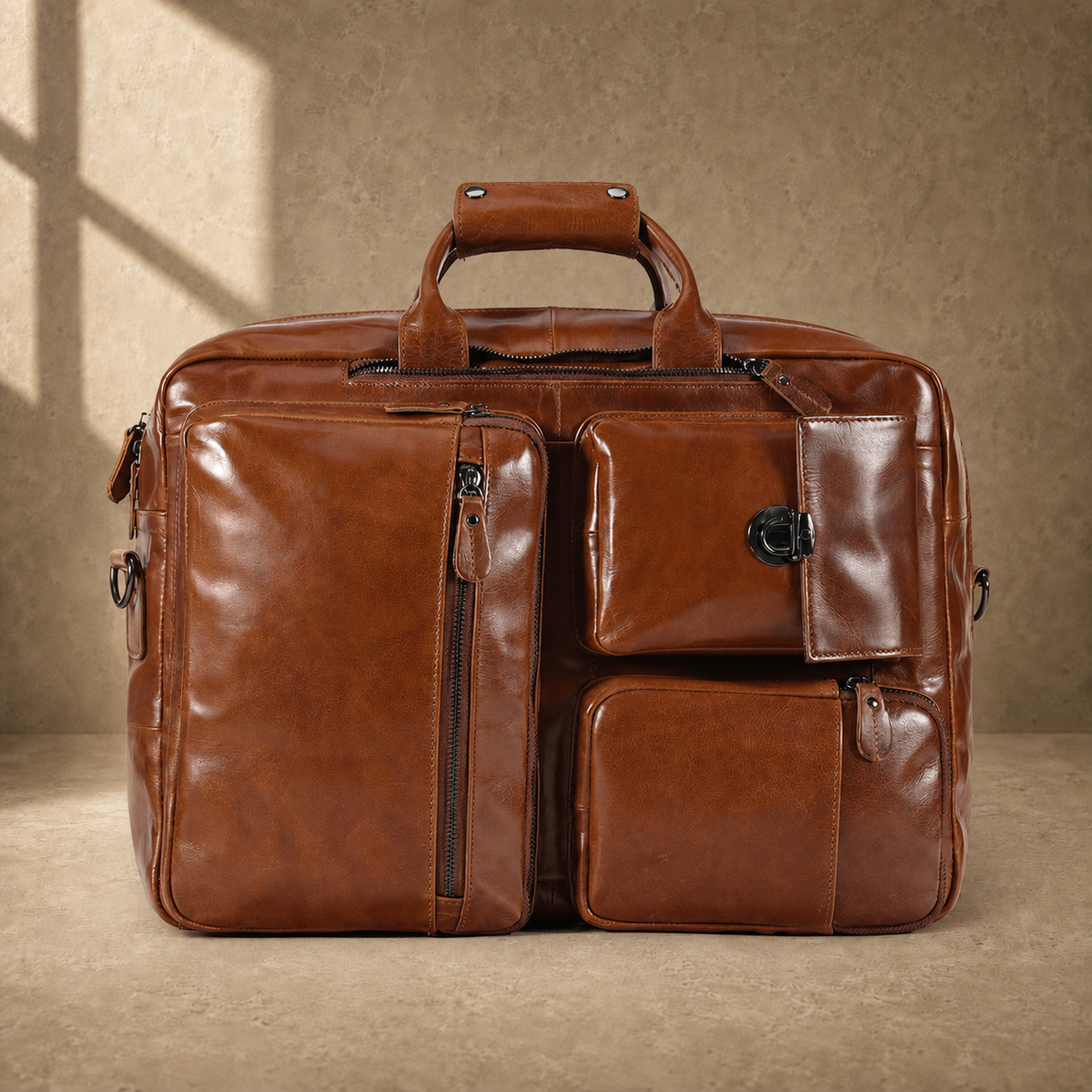 Brown leather convertible laptop bag without shoulder strap, front view