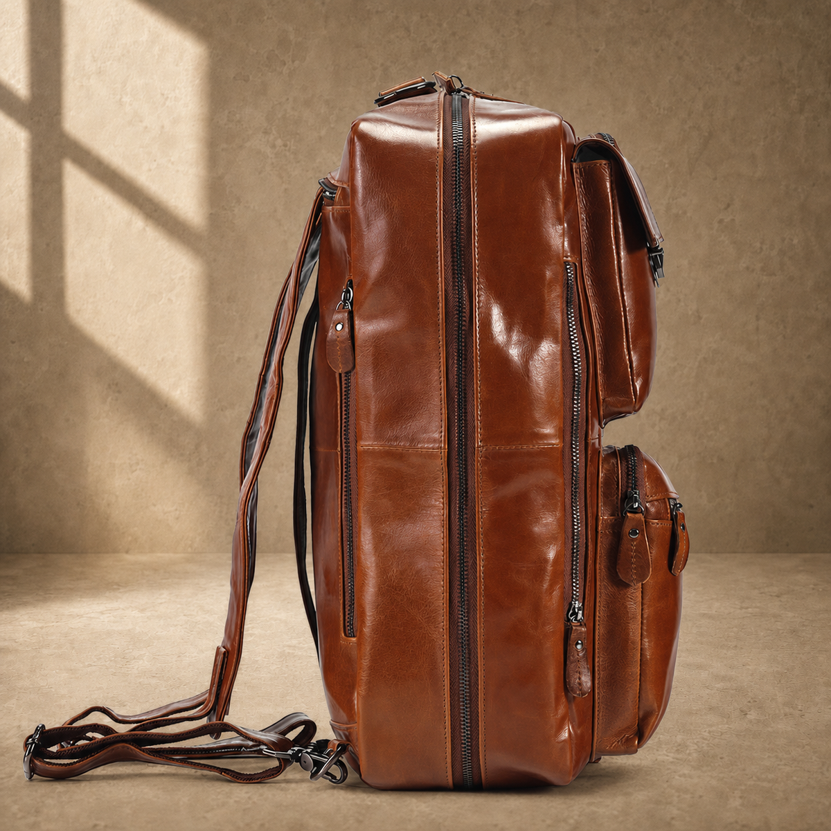 Brown leather convertible laptop bag in backpack mode, side profile