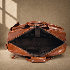 Brown leather convertible laptop bag, empty main compartment