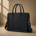 Black vegetable-tanned leather briefcase, three-quarter front view