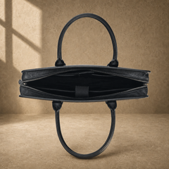 Black vegetable-tanned leather briefcase, open empty interior