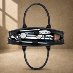 Black vegetable-tanned leather briefcase, packed capacity view