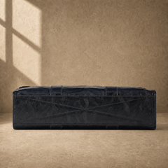 Black wrinkled leather briefcase, alternate cross-stitched base view