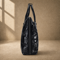 Black leather 17-inch work briefcase, side profile