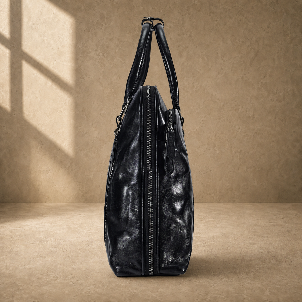 Black leather 17-inch work briefcase, side profile