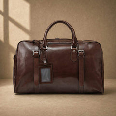 Coffee cowhide executive travel tote with luggage tag, front view