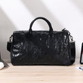 Front product view of The Nightfall Black Leather Weekender