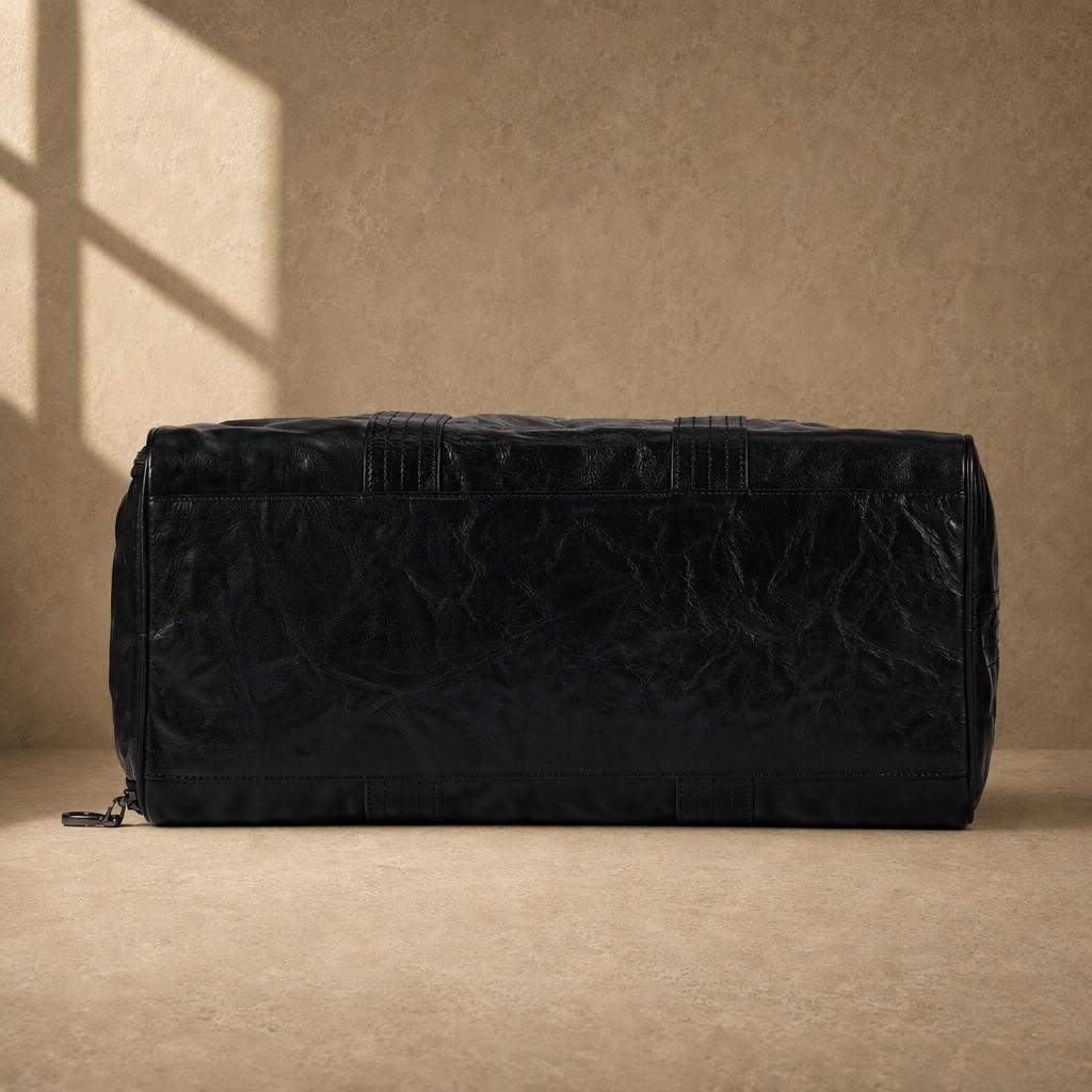 Bottom view of black cowhide leather weekender duffel bag