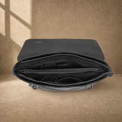 Black leather commuter messenger bag, empty organized interior