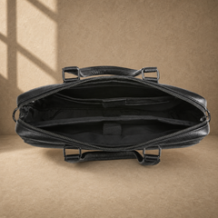 Black leather multi-pocket briefcase, empty divided interior