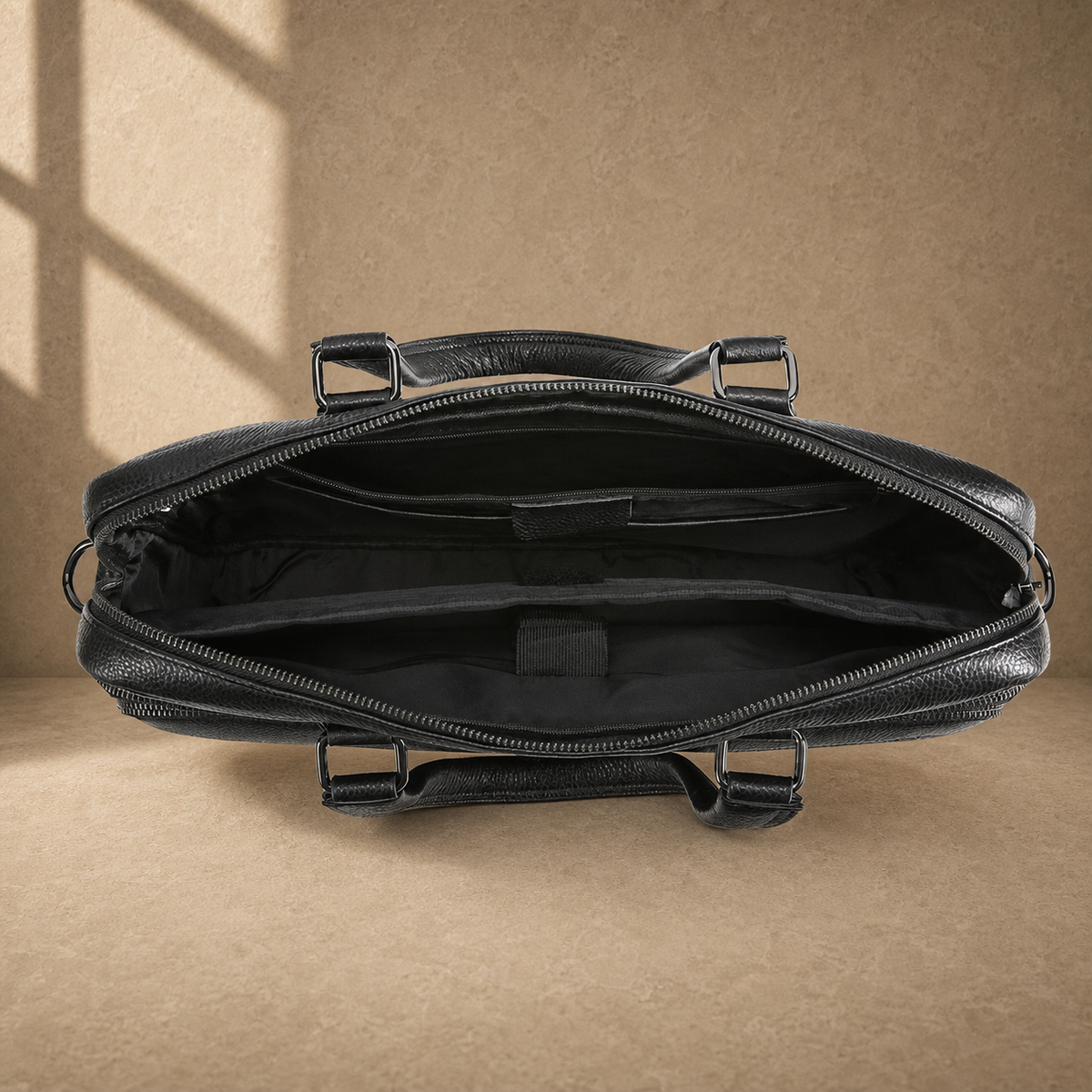 Black leather multi-pocket briefcase, empty divided interior