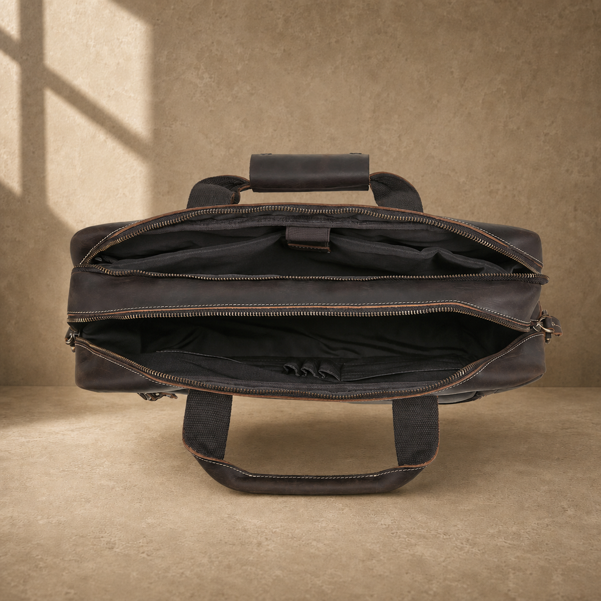 Brown leather multi-pocket briefcase, empty divided interior