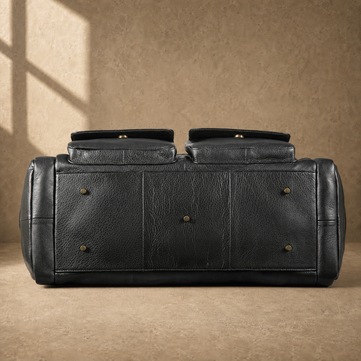 Black waxed leather organizer duffel, reinforced base
