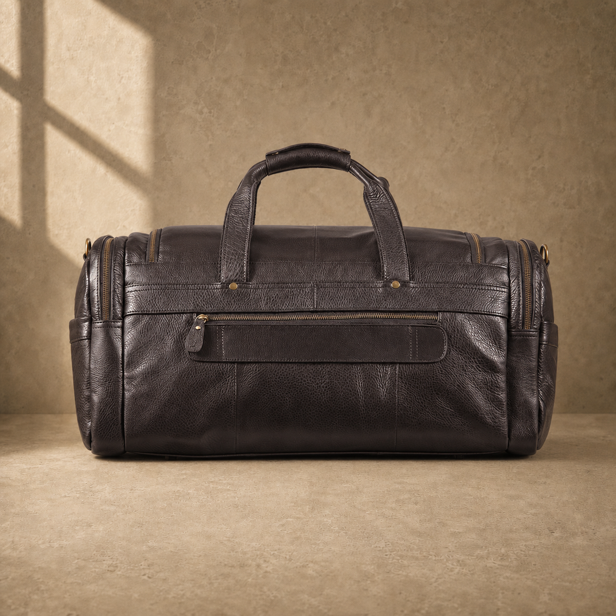 Coffee brown leather utility travel duffel, rear view
