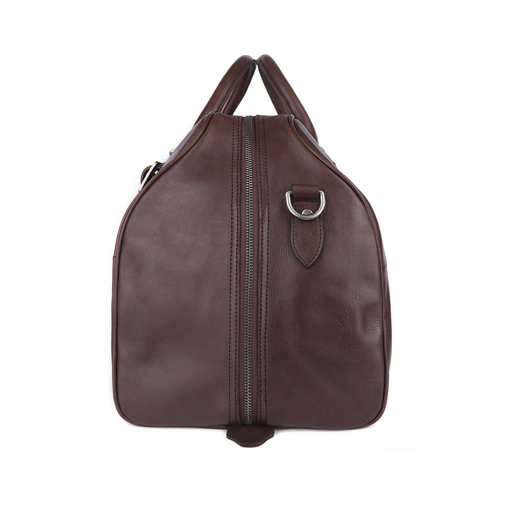 Angled view showing the handles, shoulder strap and curved sides