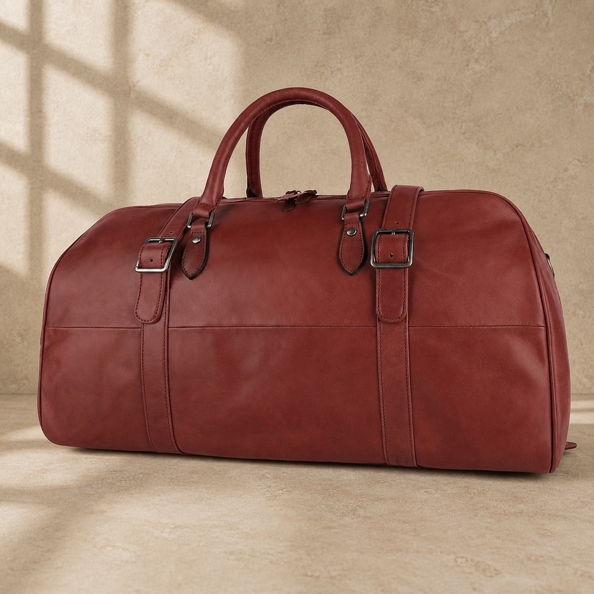 Burgundy leather large weekender bag, three-quarter view
