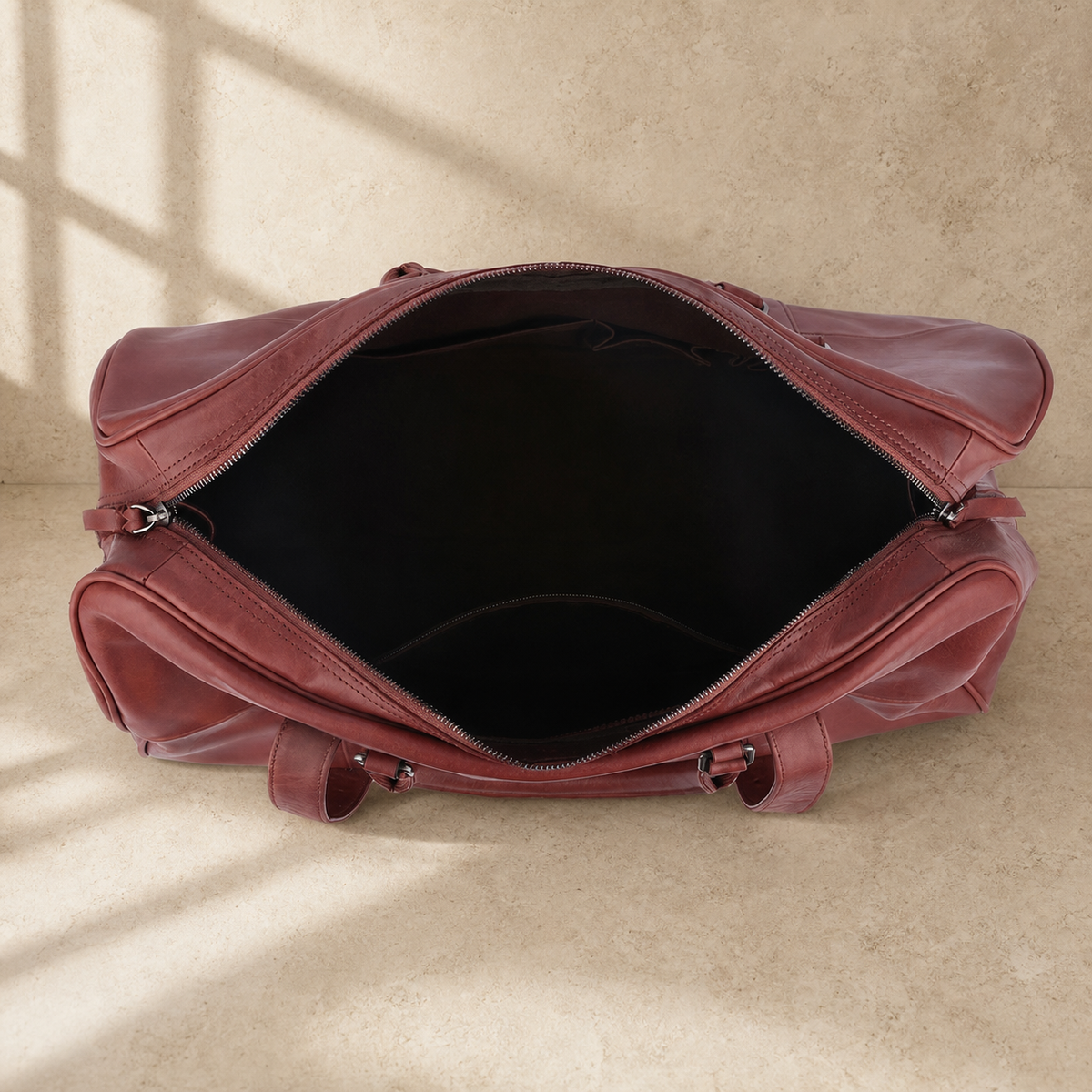 Burgundy leather large weekender bag, empty organized interior