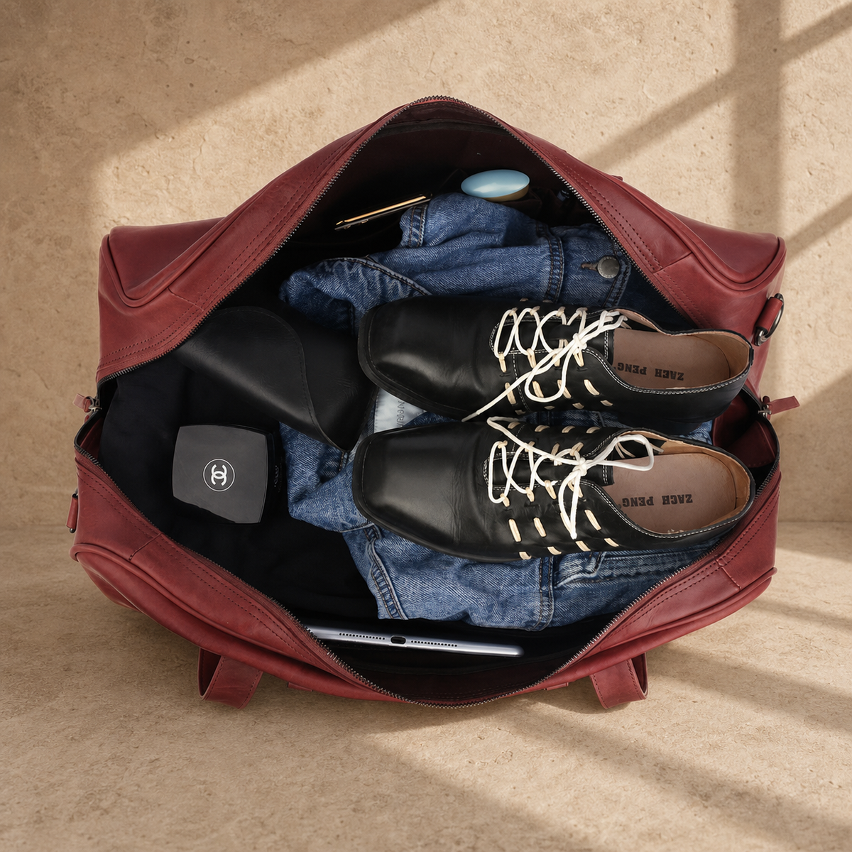 Burgundy leather large weekender bag, packed travel capacity