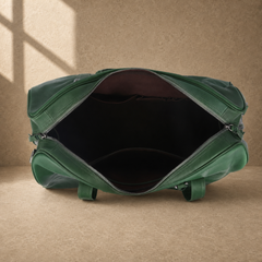 Forest green leather large weekender duffel showing empty lined interior