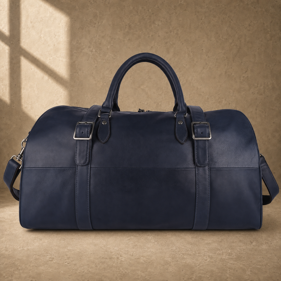 Navy structured buckle travel duffel, front view with shoulder strap