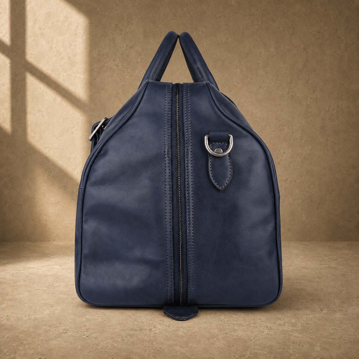 Navy structured buckle travel duffel, zippered side view
