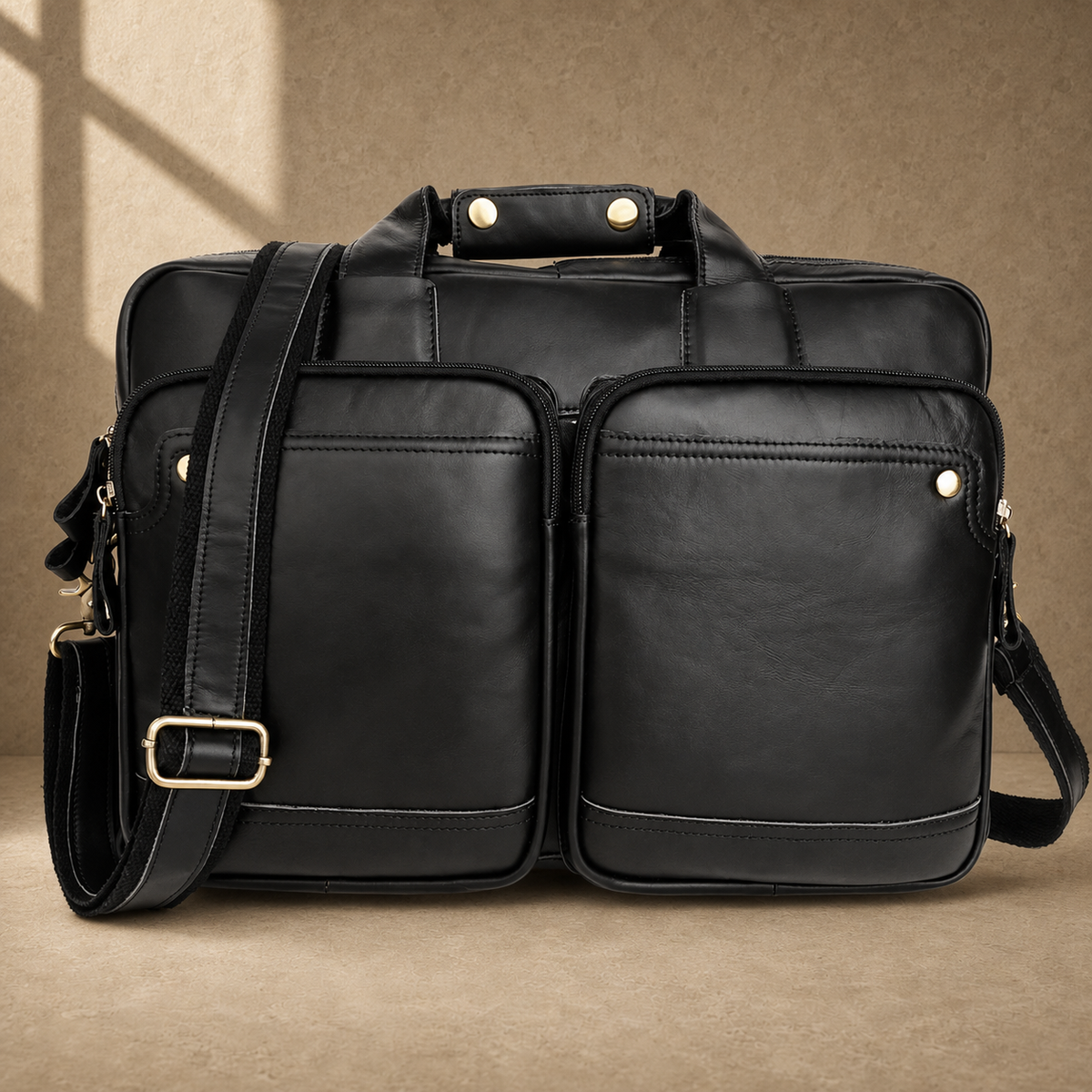 Black cowhide multi-pocket briefcase front view with shoulder strap