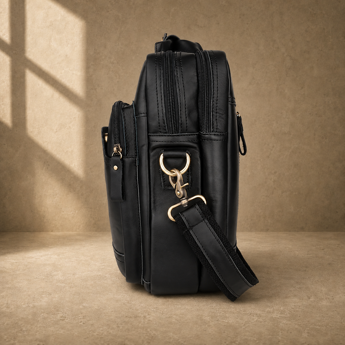 Black cowhide multi-pocket briefcase side profile