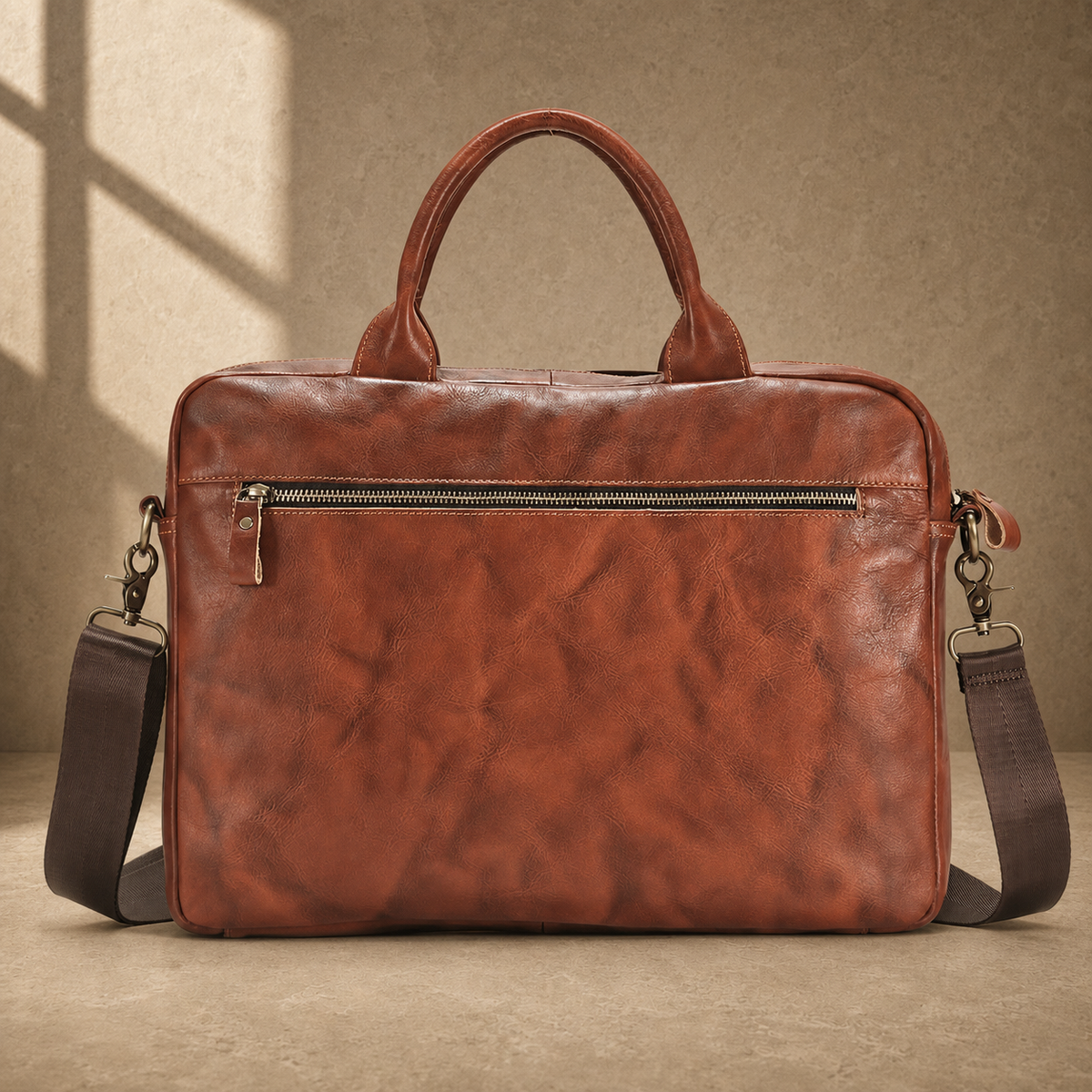 Brown cowhide leather work briefcase, rear zipper pocket view