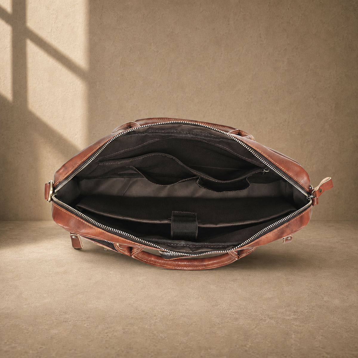 Brown cowhide leather work briefcase, open empty interior view