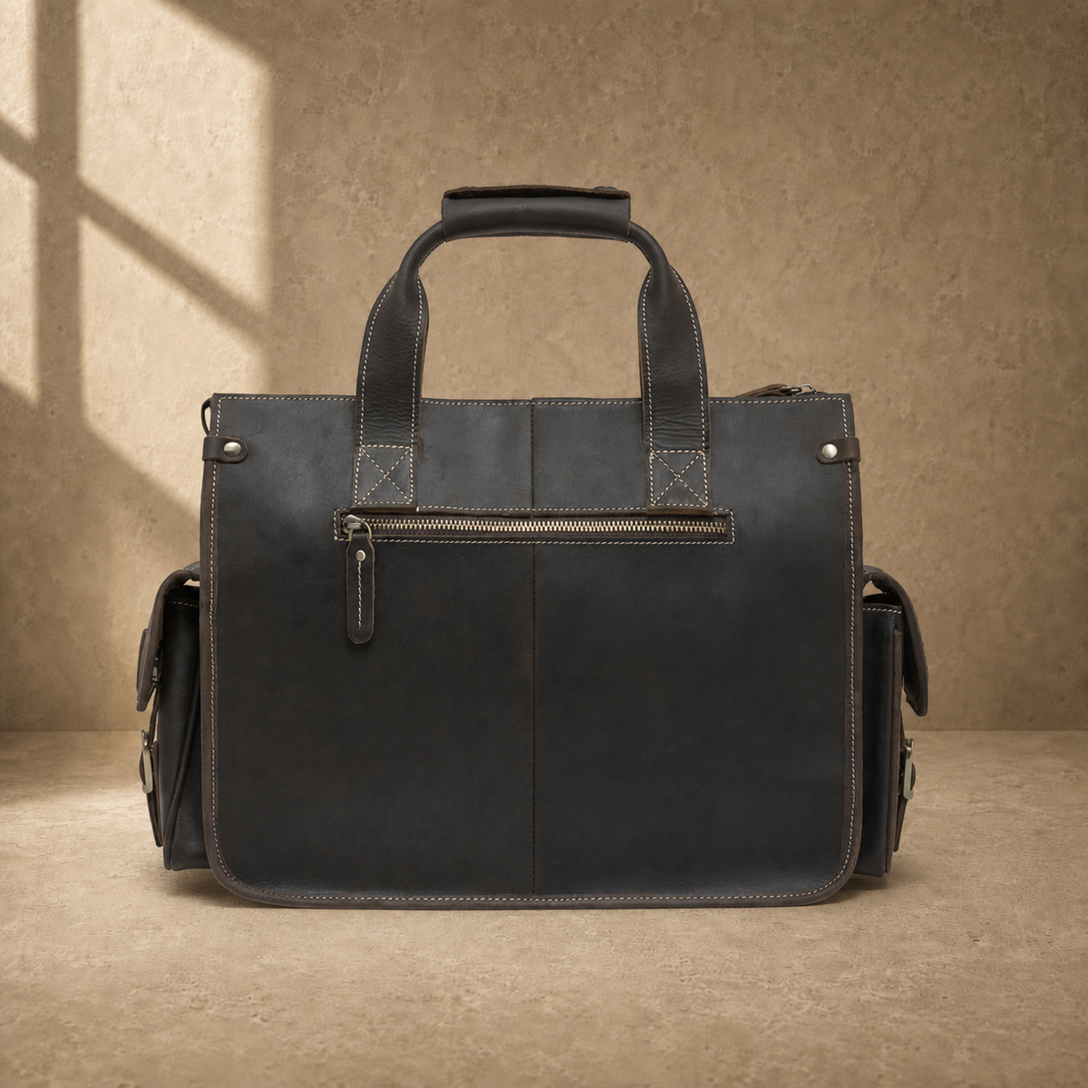 Coffee brown leather camera work bag, rear zipper pocket view