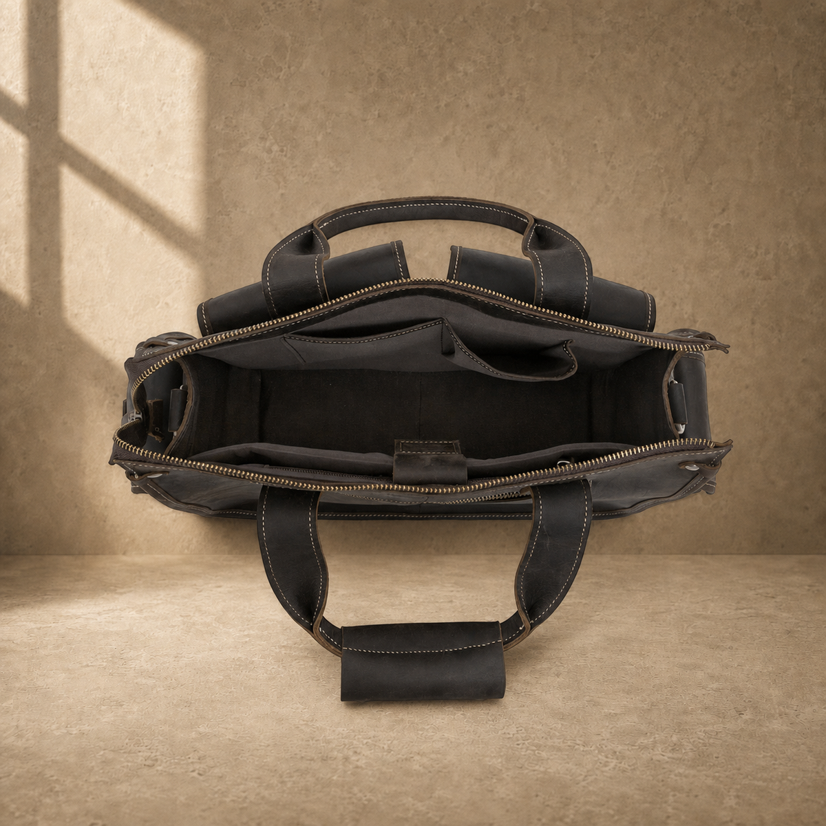 Coffee brown leather camera work bag, open empty interior view
