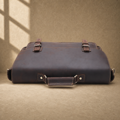 Coffee brown leather buckle briefcase top and handle construction view