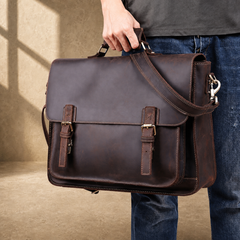 Coffee brown leather buckle briefcase carried by top handle