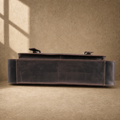 Deep coffee leather buckle briefcase reinforced base view
