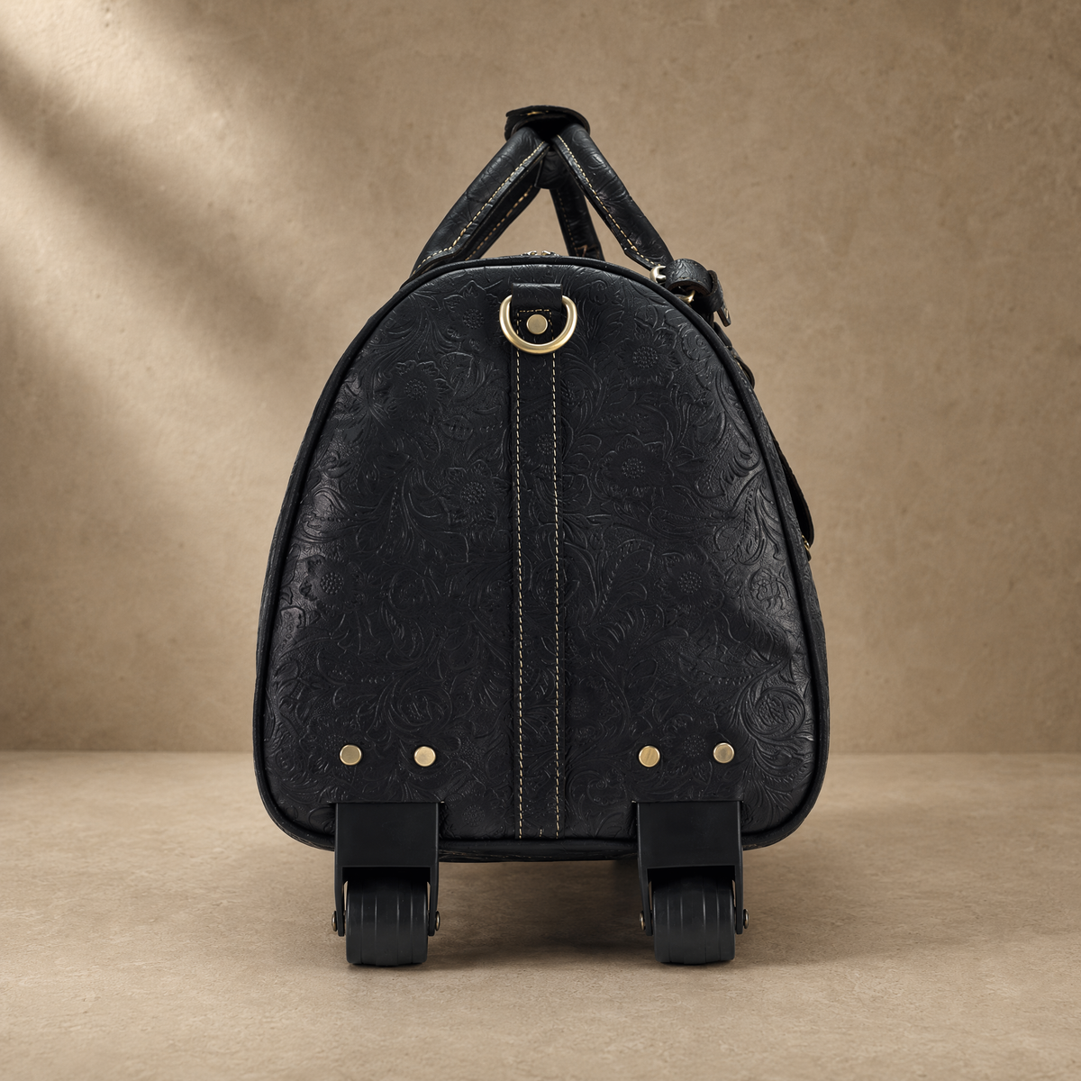 Black Embossed Rolling Travel Duffle