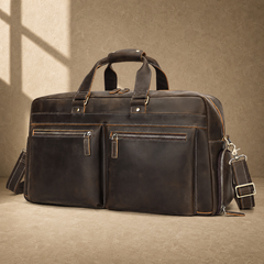 Deep coffee leather weekender duffle, front three-quarter view